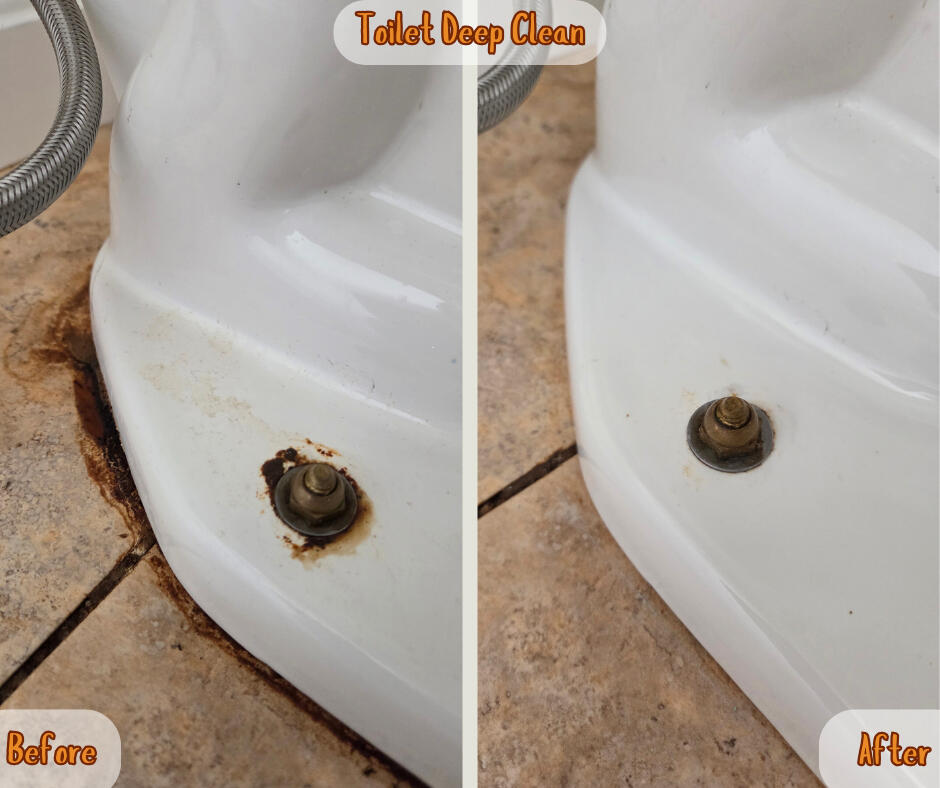 Toilet with build up around the base that got cleaned.