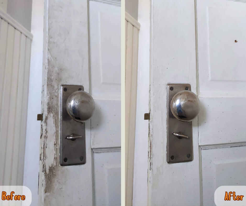 White door with grime scrubbed away.