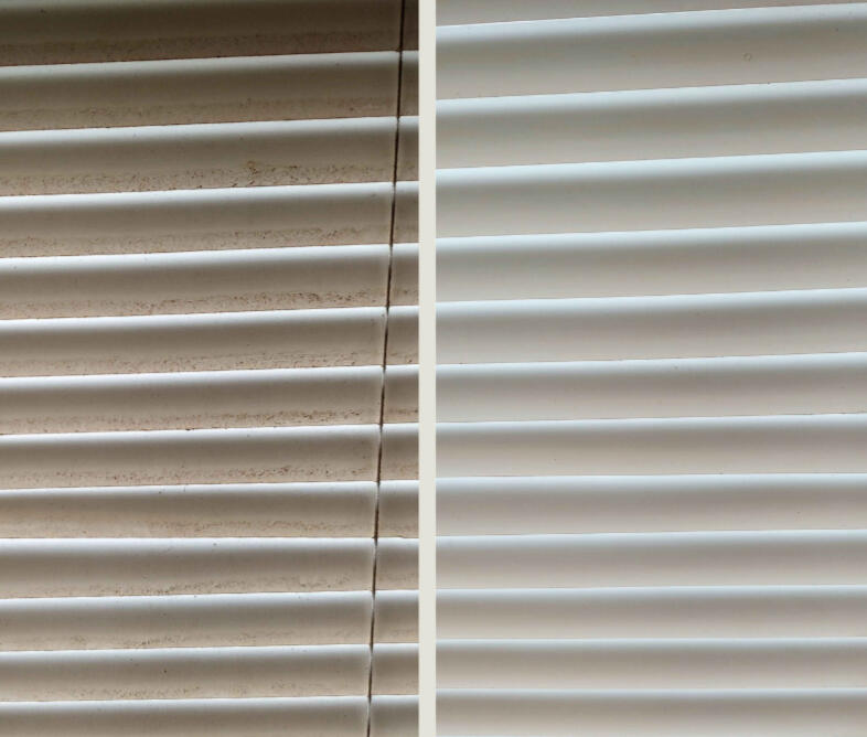 Dirty window blinds that were deep cleaned.